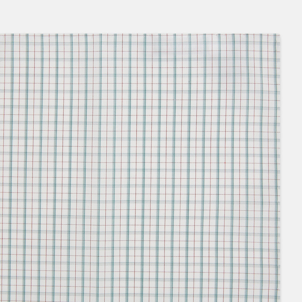 The Turnbull & Asser Green Multi Graph Check Hand-Rolled Handkerchief features a graph check pattern with thin colorful lines forming small squares, hand-rolled edges, and is laid flat against a white background.