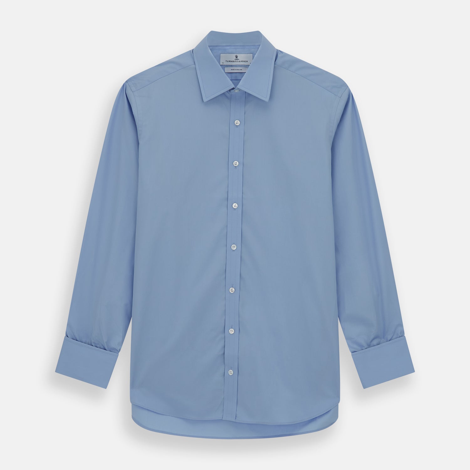 View 1 of product The Turnbull & Asser Blue Cotton Shirt features a T&A collar, double cuffs, and white buttons. This classic formal shirt is perfect for any gentleman and pairs effortlessly with a navy suit. Displayed on a plain white background.