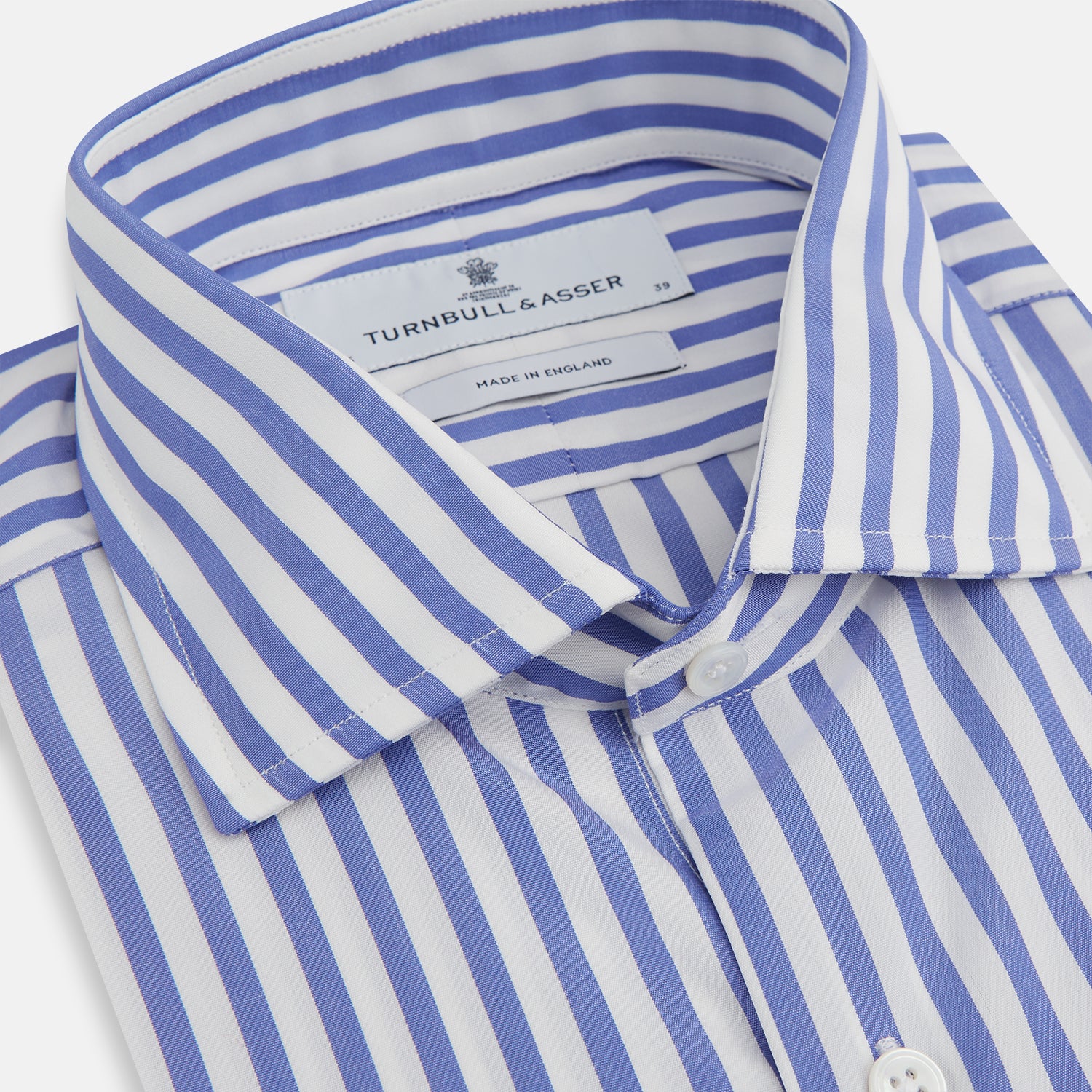 View 2 of product The Turnbull & Asser Tailored Fit Blue and White Candy Stripe Shirt, featuring a Kent collar and 3-button cuffs, is displayed neatly on a white background.