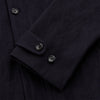 View 4 of product A navy button-up Primrose overshirt by Turnbull & Asser with a classic collar, two side pockets, a left chest pocket, and buttoned cuffs—an ideal blazer alternative, shown on a plain white background.