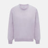 View 1 of product The Turnbull & Asser Lilac Cashmere Round Neck Jumper for men features long sleeves with ribbed cuffs and hem, offering a stylish, refined look. Shown against a white background.