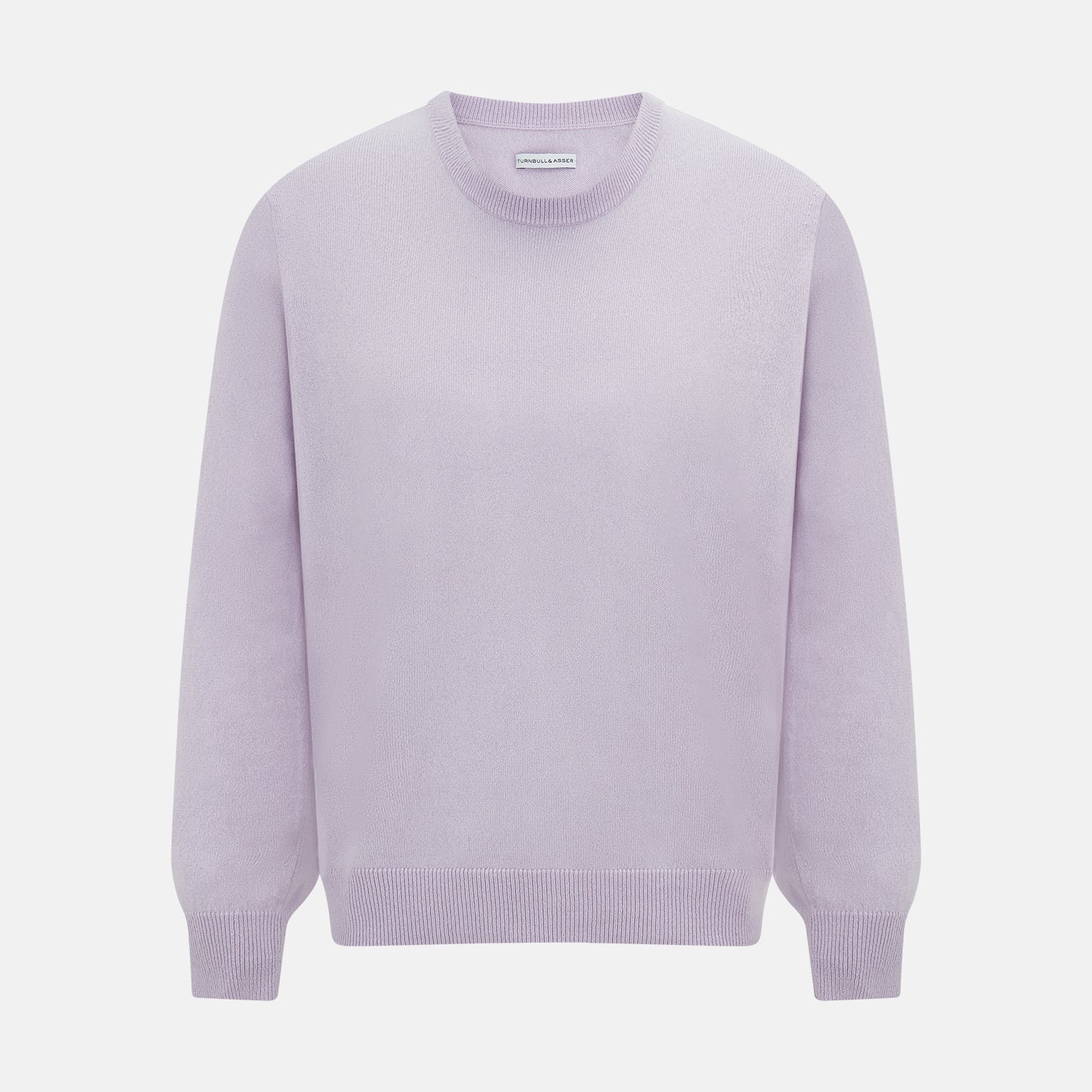 View 1 of product The Turnbull & Asser Lilac Cashmere Round Neck Jumper for men features long sleeves with ribbed cuffs and hem, offering a stylish, refined look. Shown against a white background.
