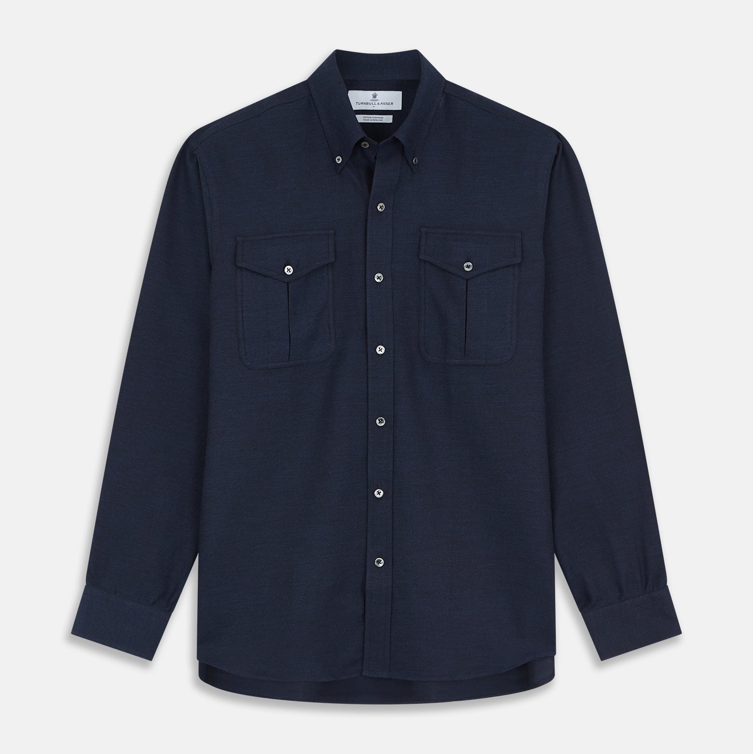 View 1 of product The Turnbull & Asser Navy Weekend Fit Nevis Cotton-Cashmere Shirt features a Dorset collar, button front, 1-button cuffs, and two button-flap chest pockets, shown laid flat on a white background.