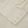 View 6 of product The Cream Cotton Weekend Fit Western Shirt with Dorset Collar by Turnbull & Asser features two chest pockets and is laid flat on a white background—ideal for smart-casual style.