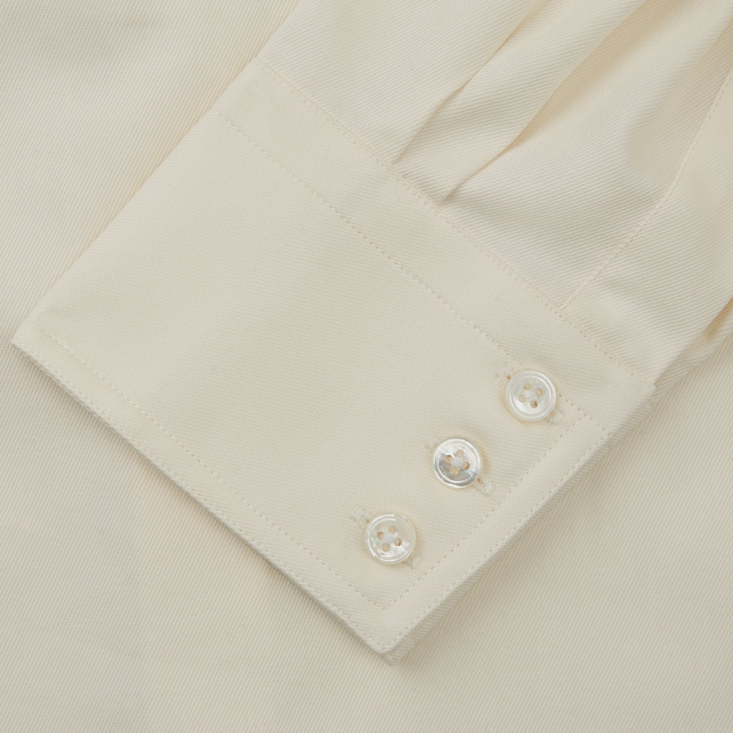 View 6 of product The Cream Cotton Weekend Fit Western Shirt with Dorset Collar by Turnbull & Asser features two chest pockets and is laid flat on a white background—ideal for smart-casual style.