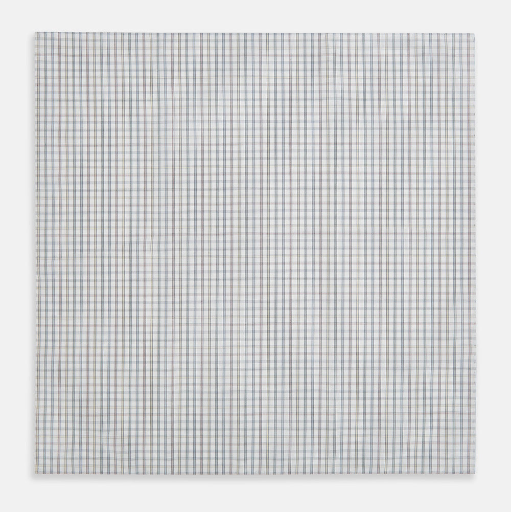 The Sky Blue Multi Graph Check Hand-Rolled Handkerchief by Turnbull & Asser features thin blue, red, and beige lines forming small squares on white fabric. Crafted in England.