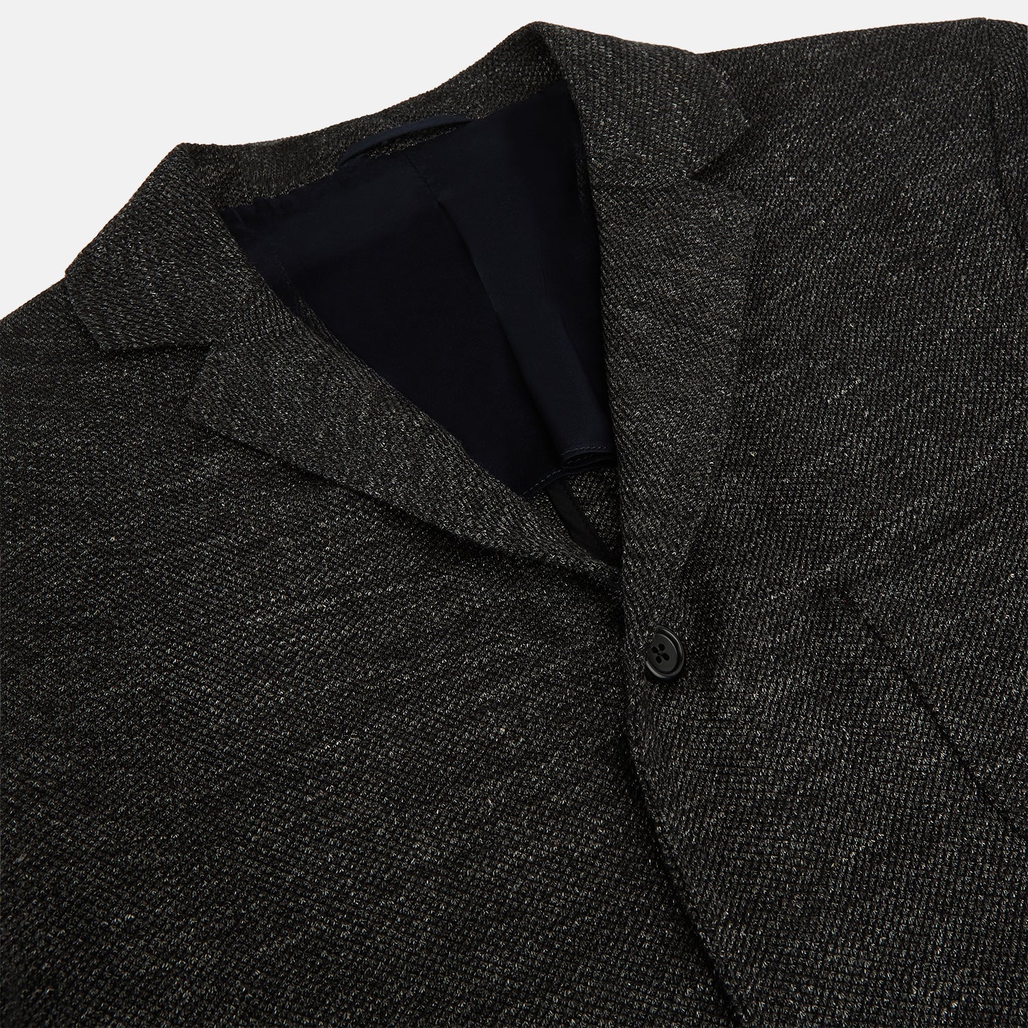 View 2 of product The Charcoal Linen Blend Cambridge blazer by Turnbull & Asser features British tailoring with a notched lapel, two front buttons, and three pockets, shown against a plain white background.