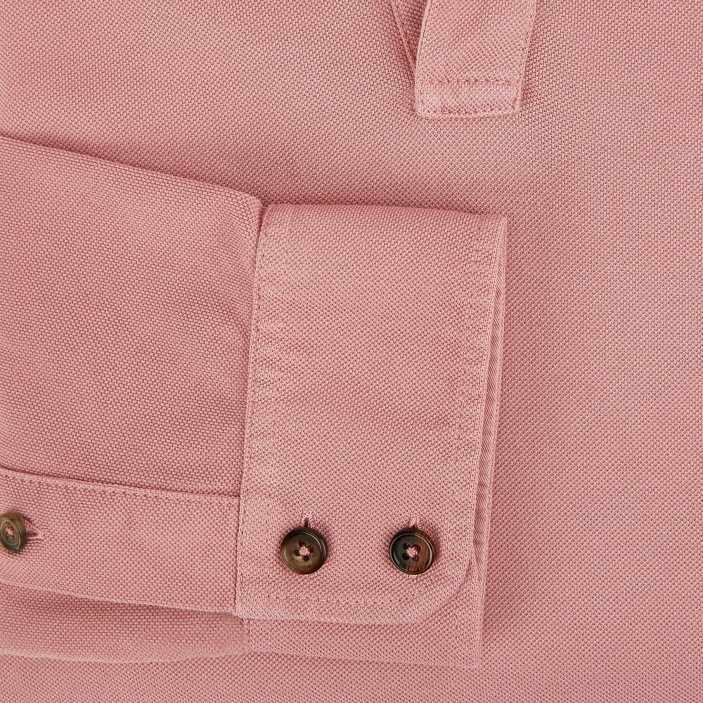A Turnbull & Asser Red Rugby Polo Shirt with long sleeves, a collared neckline, v-neck opening, and no buttons is laid flat on a white background.
