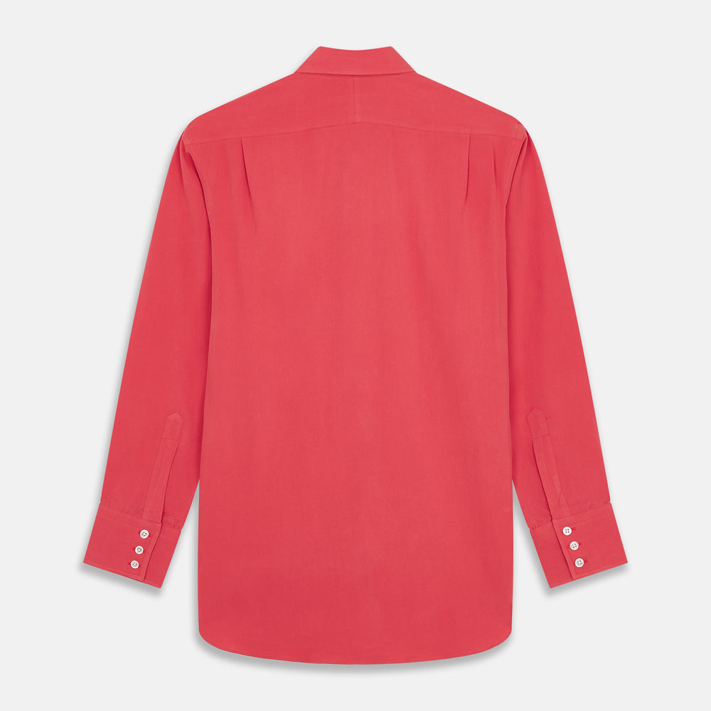 The Turnbull & Asser Coral Pink Silk Regular Fit Mayfair Shirt features long sleeves, a classic collar, and white buttons, displayed laid flat on a plain white background.
