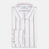 View 5 of product The Turnbull & Asser Wine Track Stripe Mayfair Shirt is a white long-sleeve shirt with vertical wine stripes and a pointed collar, crafted from premium Italian cotton and shown flat against a plain background.