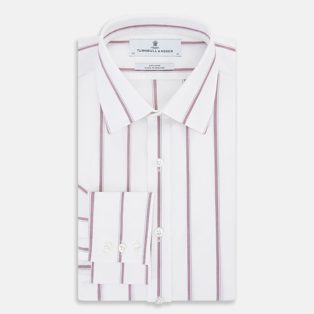 The Turnbull & Asser Wine Track Stripe Mayfair Shirt is a white long-sleeve shirt with vertical wine stripes and a pointed collar, crafted from premium Italian cotton and shown flat against a plain background.