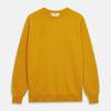View 1 of product The Gold Glenn Cashmere Crew Neck Jumper by Turnbull & Asser is a luxurious, long-sleeved knit in vibrant mustard yellow, shown laid flat on a white background—an eye-catching essential.