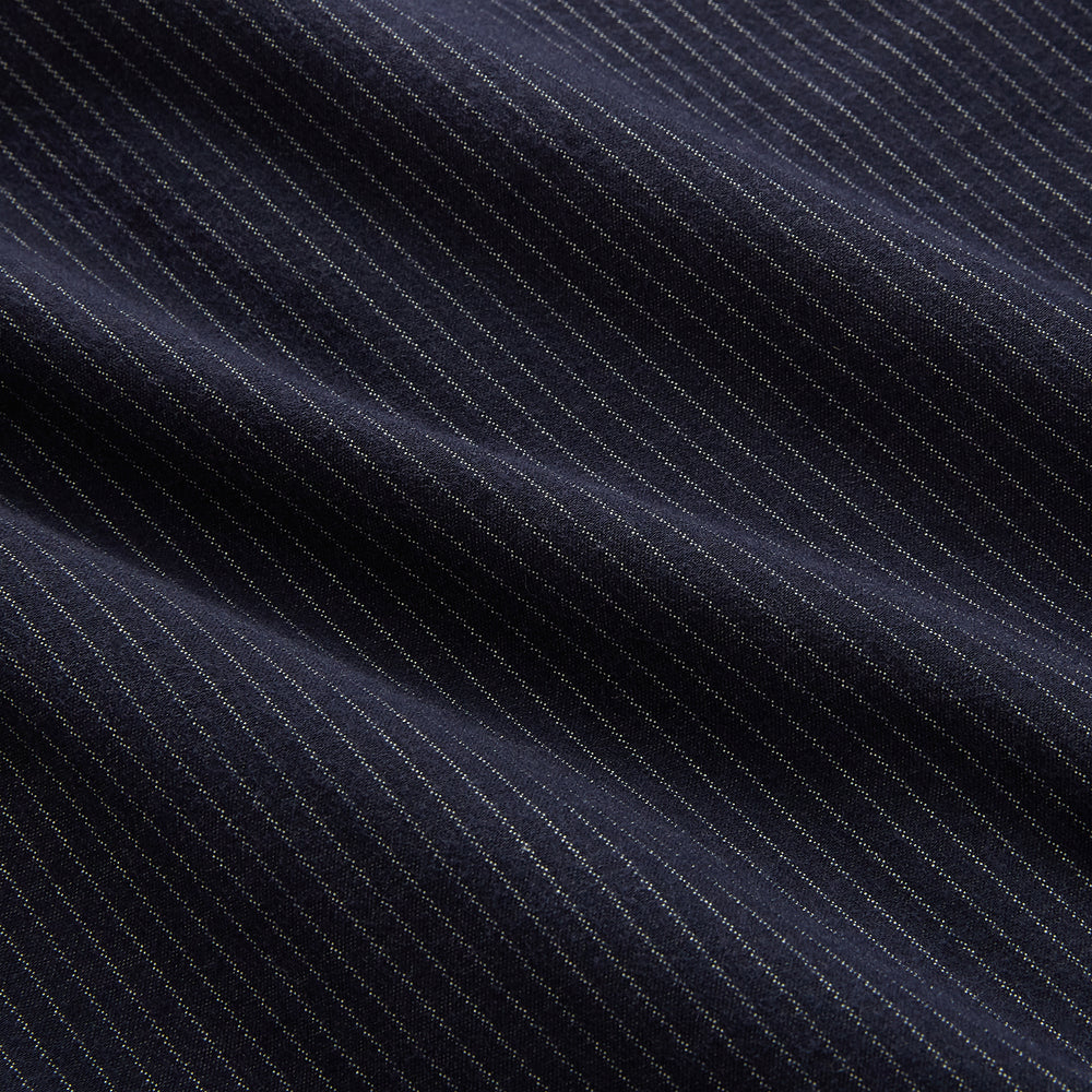 The Turnbull & Asser Navy Stripe Hampstead Overshirt features pinstripes, a collar, long sleeves, chest pocket, and two angled side pockets—ideal for refining your formal look. Shown laid flat on a light background.