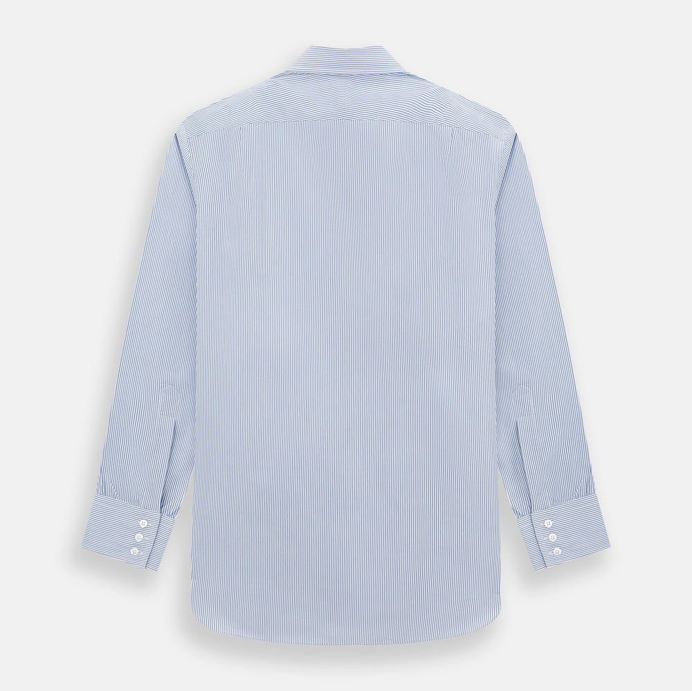 The Turnbull & Asser Pale Blue Pinstripe Mayfair Shirt features pale blue pinstripes, a classic T&A collar, white buttons, and cuffed sleeves, shown against a plain white background.