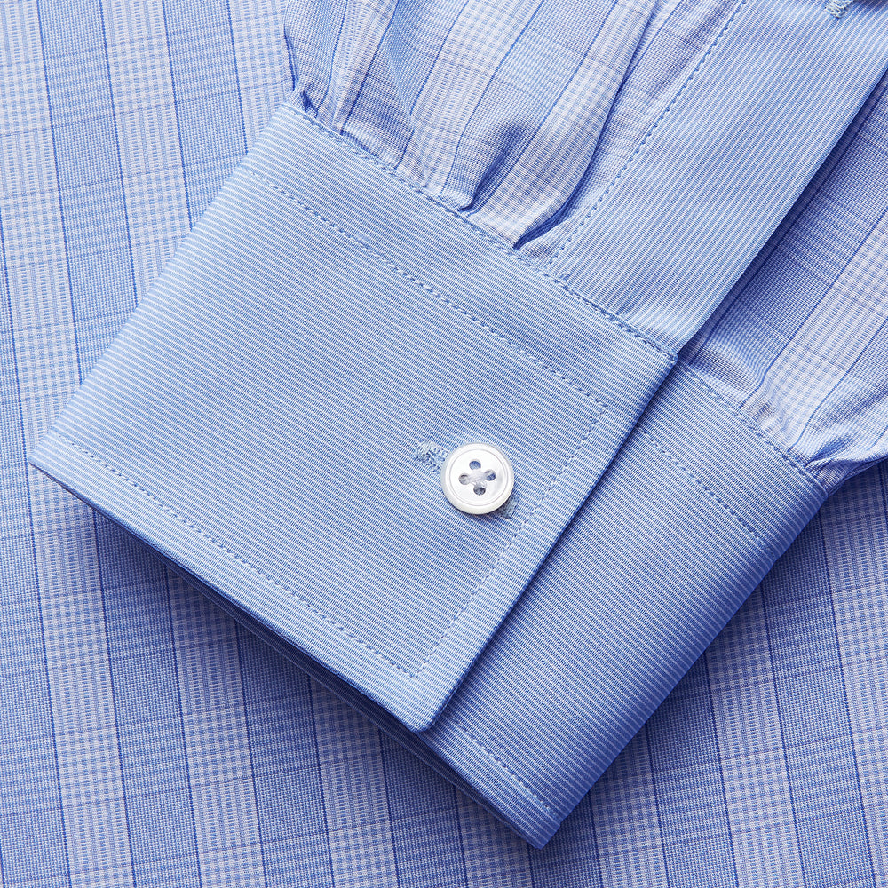 Turnbull & Asser's Blue Multi Check Cotton RE-PURPOSE Weekend Fit Suffolk Shirt, crafted from recycled fabrics, features a multi-check pattern, button-down collar, and chest pocket, and is displayed flat on a white background.
