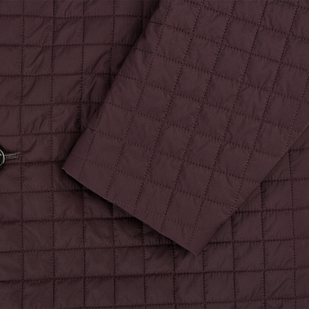 The Fulham Burgundy Single-Breasted Quilted Blazer by Turnbull & Asser features a grid pattern, notch lapel, three buttons, and three front pockets. Shown on a plain white background—ideal for the modern gentleman.