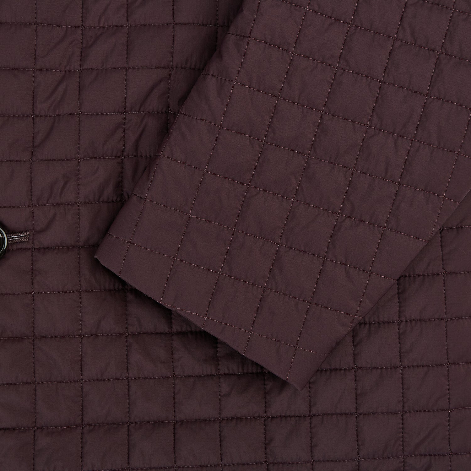 View 4 of product The Fulham Burgundy Single-Breasted Quilted Blazer by Turnbull & Asser features a grid pattern, notch lapel, three buttons, and three front pockets. Shown on a plain white background—ideal for the modern gentleman.