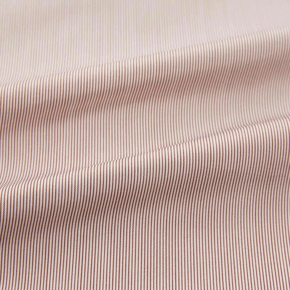 The Turnbull & Asser Burgundy Hairline Stripe Mayfair Shirt features long sleeves, a pointed collar, white buttons, and a classic Mayfair fit—perfect for formal occasions—presented against a plain white background.