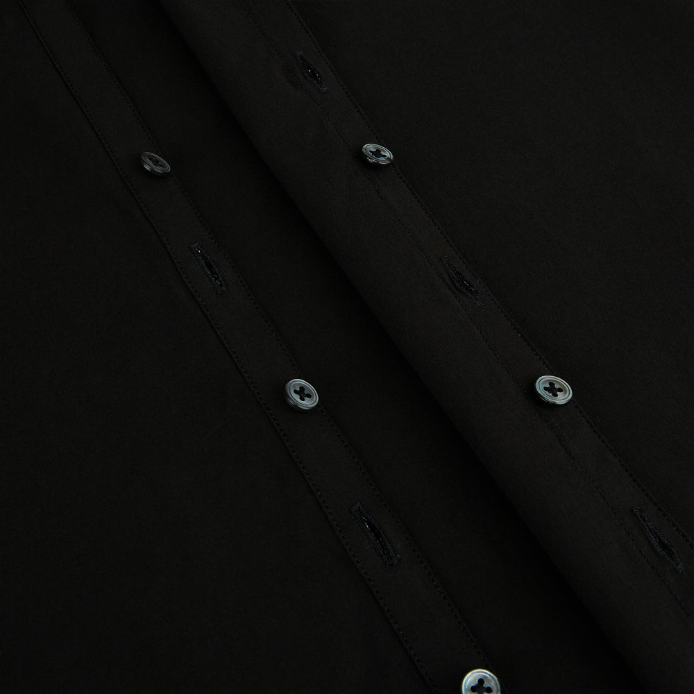 A long-sleeved, collared MIDNIGHT BLUE WINDSOR SHIRT by Turnbull & Asser, laid flat on a white background, highlights classic British craftsmanship.