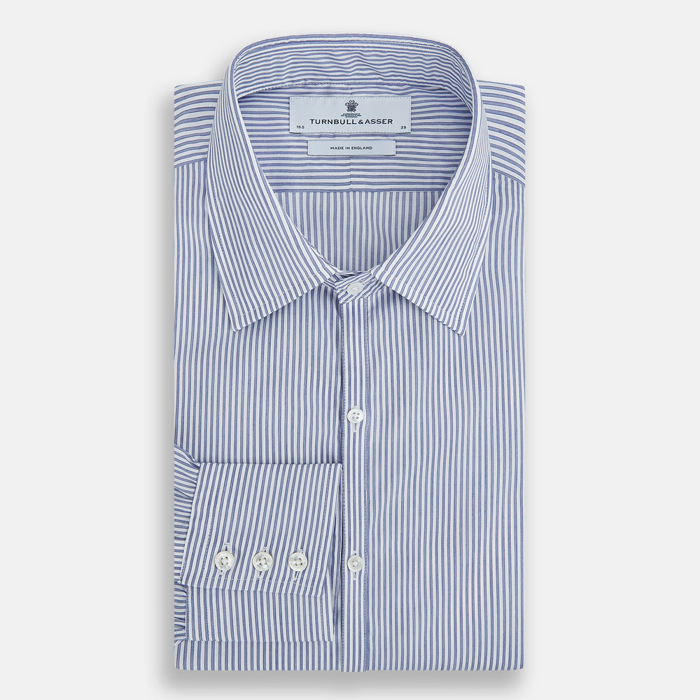The Turnbull & Asser Navy and White Stripe Westminster Shirt features thin vertical stripes, a Turnbull collar, long sleeves, and classic British craftsmanship, shown flat on a white background.