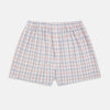 View 1 of product Turnbull & Asser's Blue and Orange Multi Graph Check Godfrey Boxer Shorts, crafted from Italian cotton, feature a multicoloured checked pattern and an elastic waistband. Shown laid flat on a white background.
