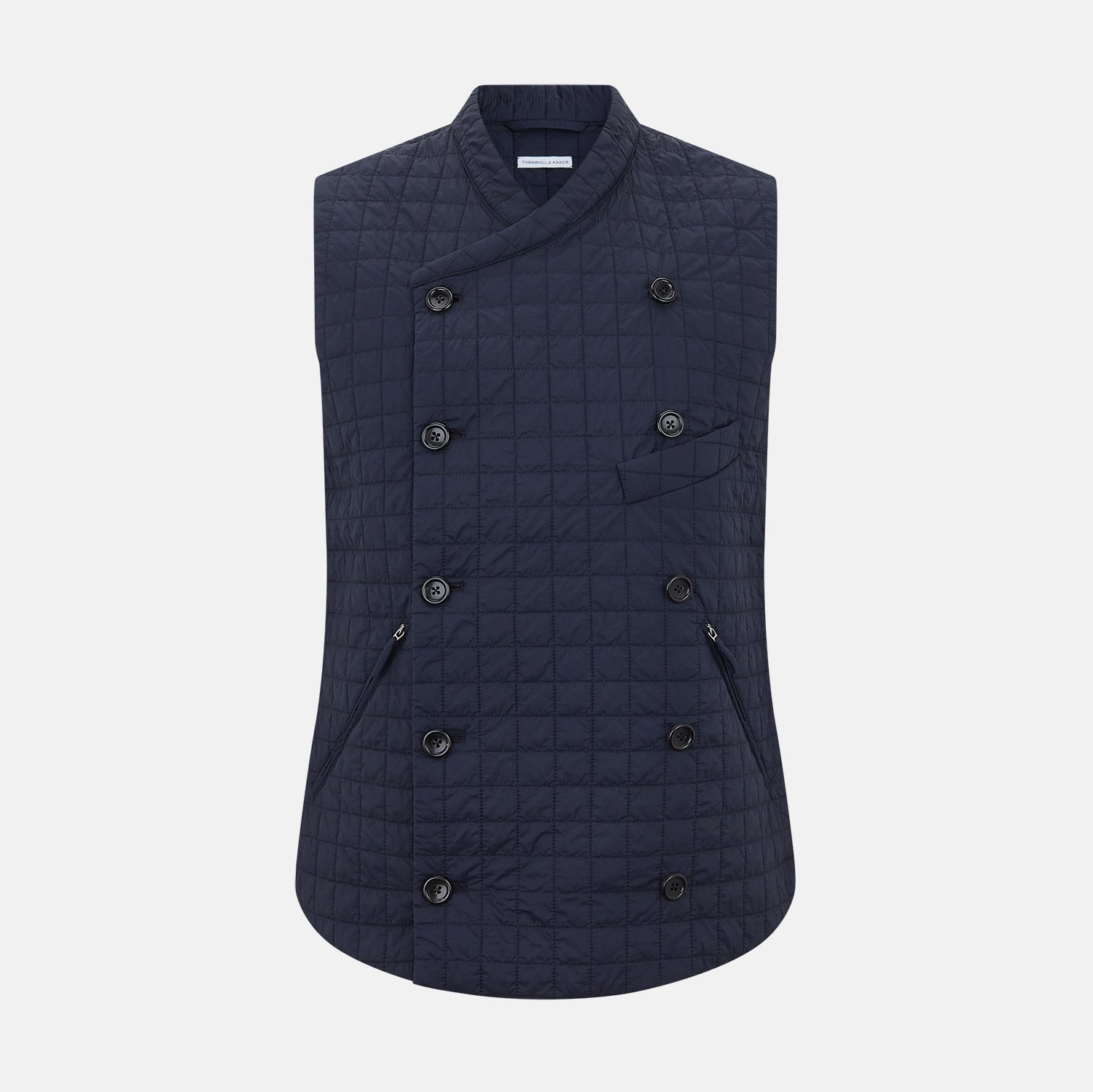 View 1 of product The Turnbull & Asser Navy Double-Breasted Quilted Gilet is a sleeveless piece with an asymmetrical button closure, chest pocket, and two zippered side pockets, shown on a plain white background—ideal for layered dressing.