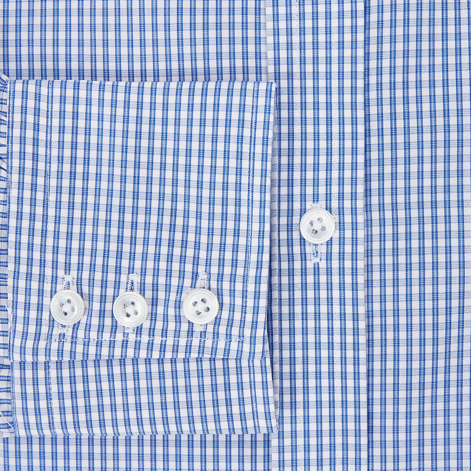 View 4 of product The Turnbull & Asser Blue Multi Micro Check Mayfair Shirt features a classic T&A collar, button-up front, white buttons, cuffed long sleeves, and a refined light blue and white micro check pattern.