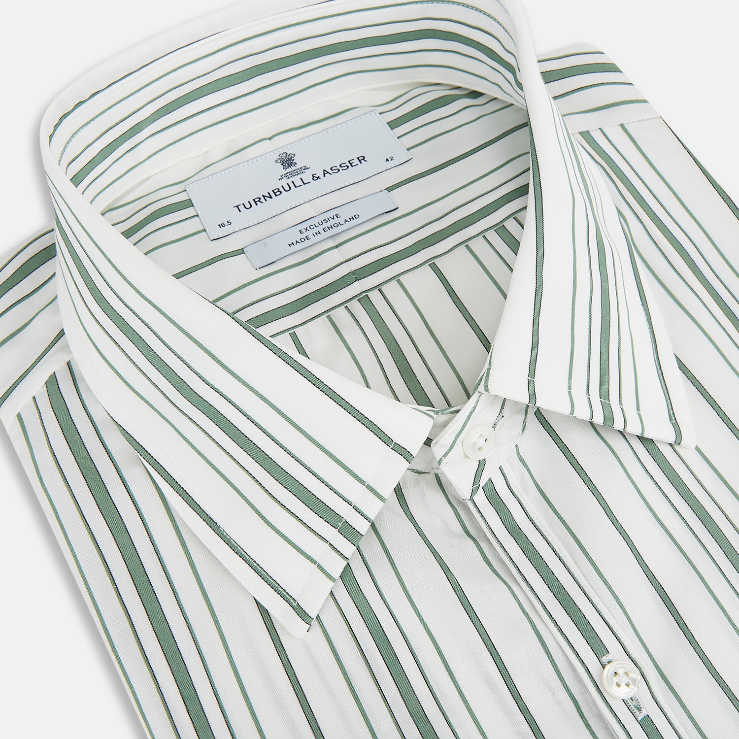 View 2 of product The SAGE GREEN MULTI STRIPE WESTMINSTER SHIRT by Turnbull & Asser features a classic collar, long sleeves, buttoned cuffs, relaxed fit, and vertical green and white stripes—embodying timeless British craftsmanship.