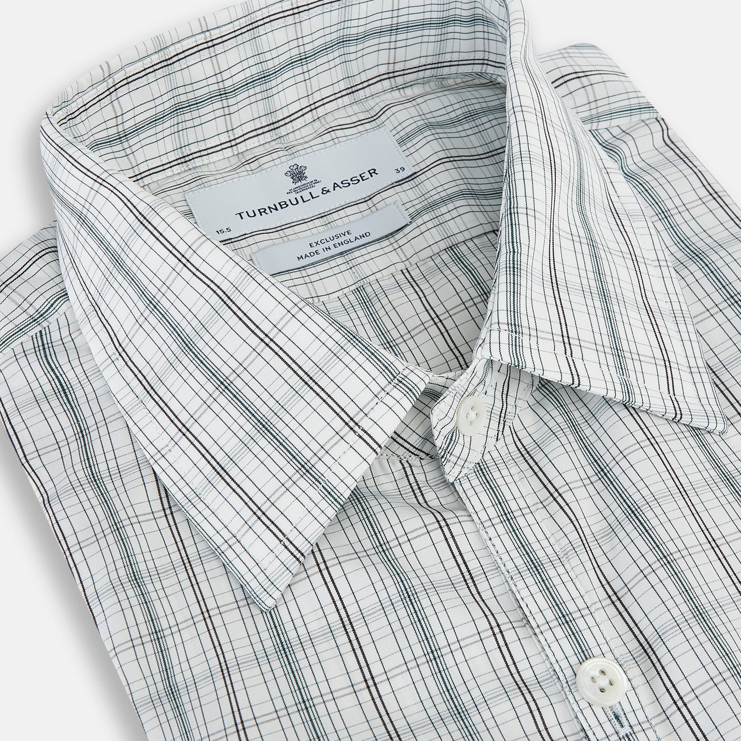 View 2 of product The Turnbull & Asser Forest Green Multi Check Westminster Shirt is a tailored, long-sleeved, button-up shirt with a collar and a white base featuring light blue and green plaid, displayed flat on a white background.