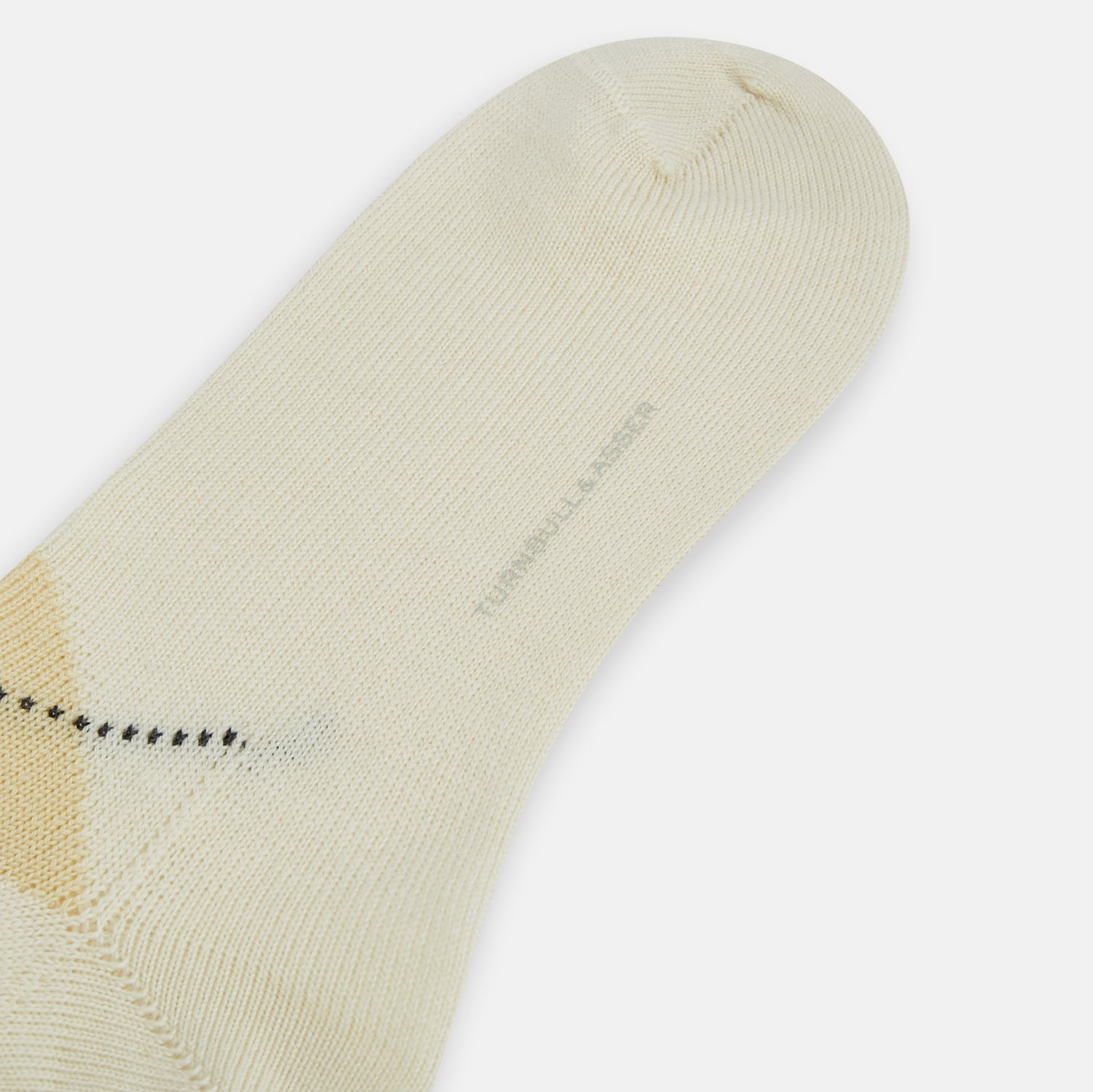 View 3 of product A single Turnbull & Asser White Wool Check Mid-Length Sock, featuring a subtle check pattern in tan, cream, and light brown shades, is displayed on a plain white background.