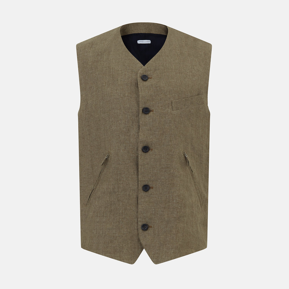 An olive, sleeveless linen twill waistcoat by Turnbull & Asser with a V-neck, five black buttons, two slanted zippered pockets, and a chest pocket, shown against a plain white background.