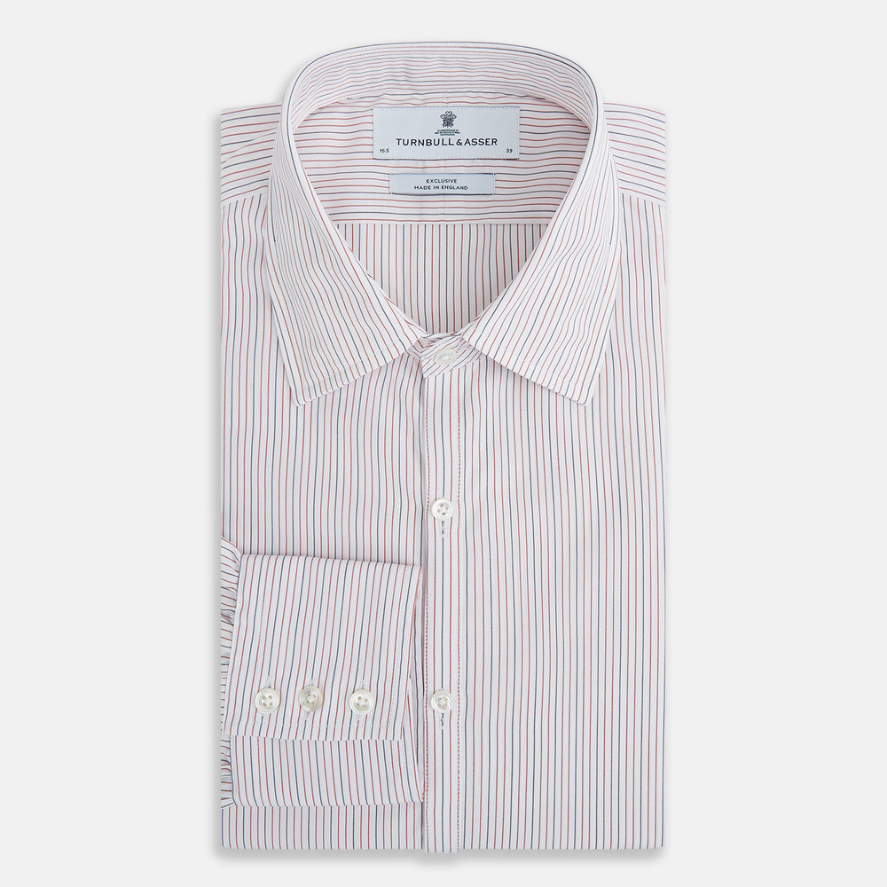 The Turnbull & Asser Red and Blue Ticking Stripe Westminster Shirt features long sleeves, a button-up front, pointed collar, and buttoned cuffs, highlighting British craftsmanship while laid flat on a white background.