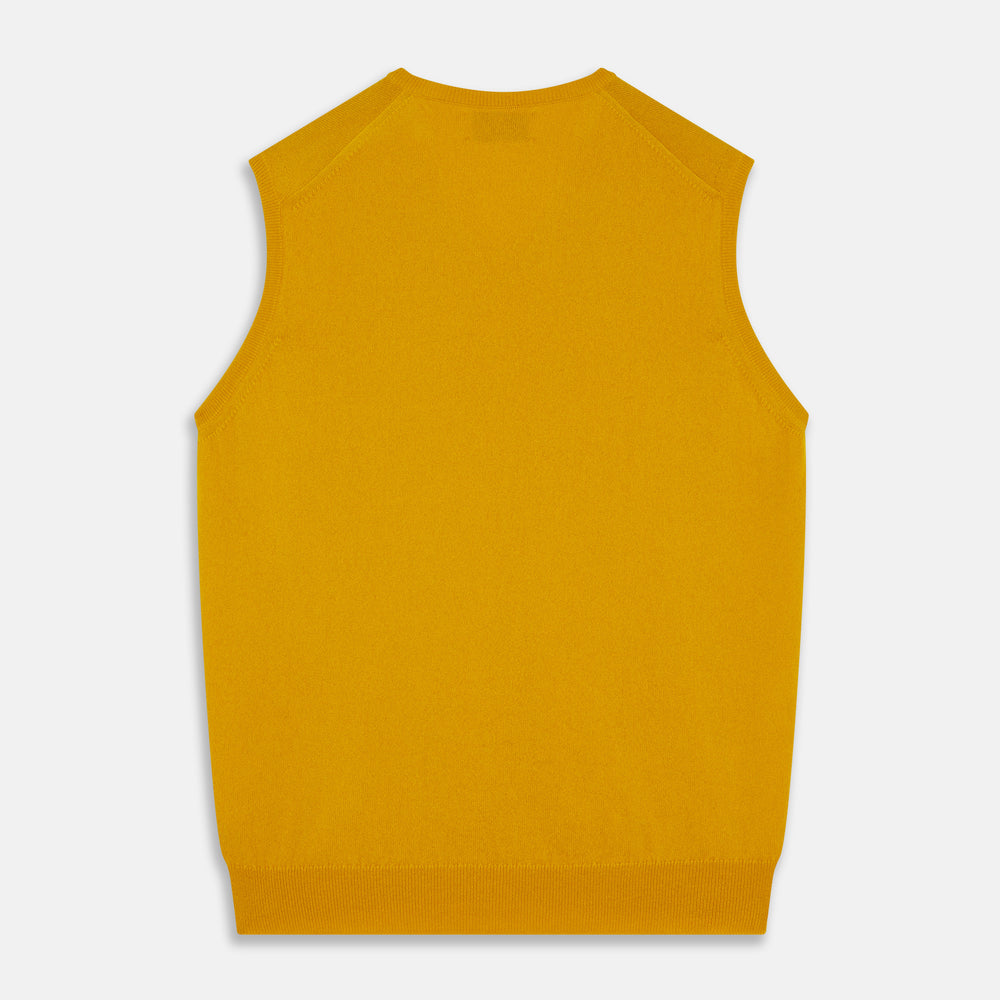 The Gold Ifor Cashmere Slipover by Turnbull & Asser is a sleeveless, V-neck knit in bright mustard yellow, made in Scotland and shown laid flat against a white background.