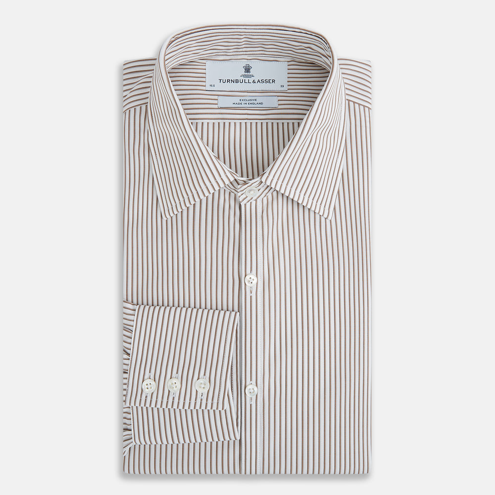 The Turnbull & Asser Coffee Multi Stripe Westminster Shirt features long sleeves, a button-up front, subtle beige and white stripes, a pointed Turnbull collar, and buttoned cuffs—expertly crafted in Britain and shown flat on a white background.