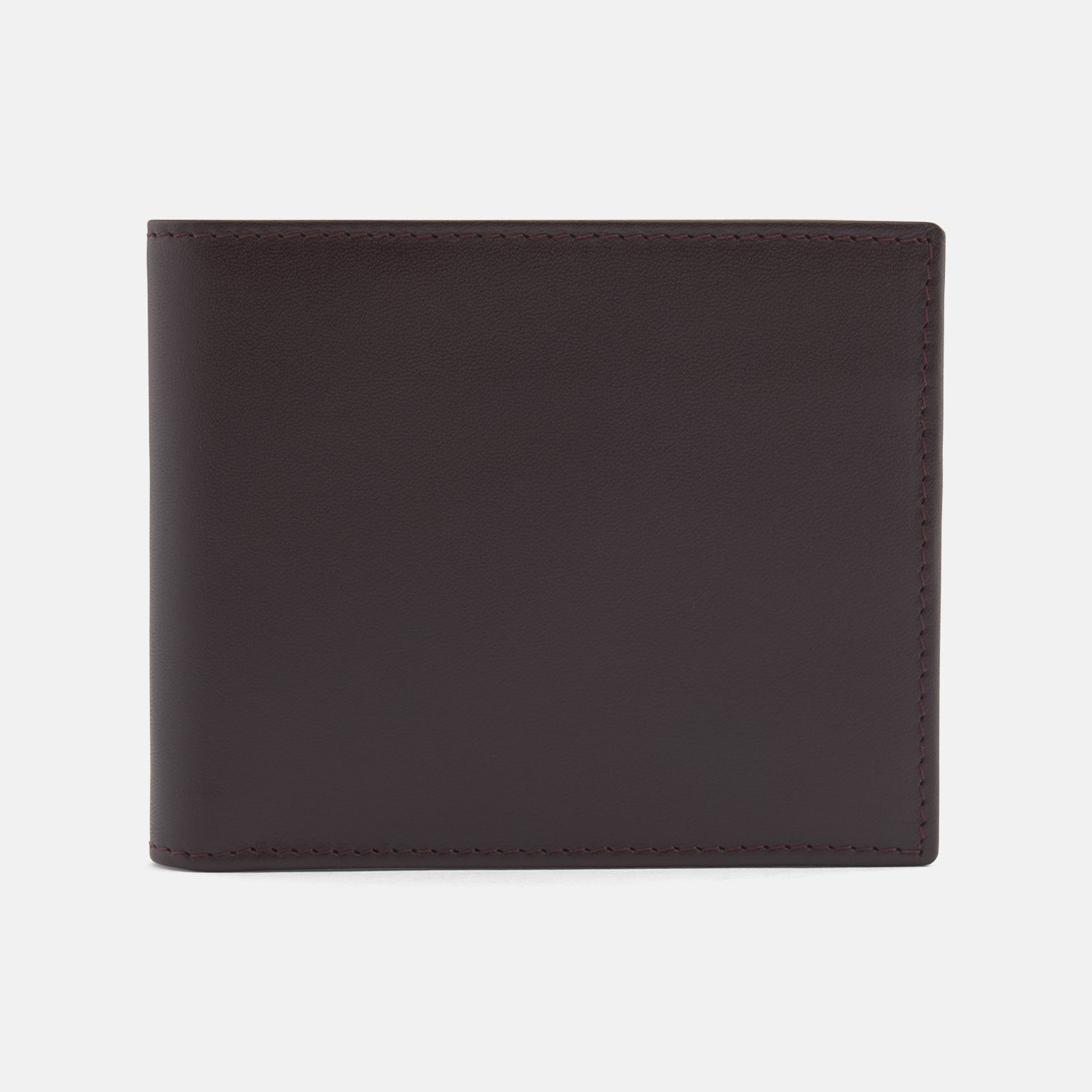 View 1 of product The Turnbull & Asser Brown Leather Billfold Wallet is shown closed against a plain white background, highlighting its slim, stylish design for everyday use.