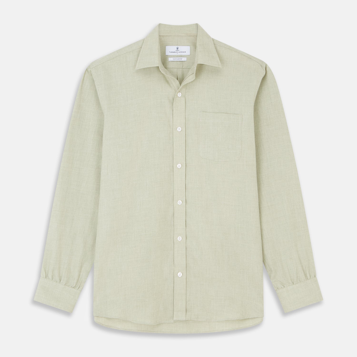 View 1 of product The Turnbull & Asser Soft Green Cashmerello Weekend Fit Finch Shirt features a Derby collar, long sleeves, chest pocket, white buttons, and cuffs. Laid flat on a white background.