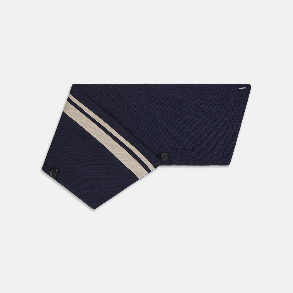 The Navy and Sand Stripe Neck Warmer by Turnbull & Asser features two beige diagonal stripes and a black button, draped in a V shape on a white background—an elegant formal accessory for any occasion.