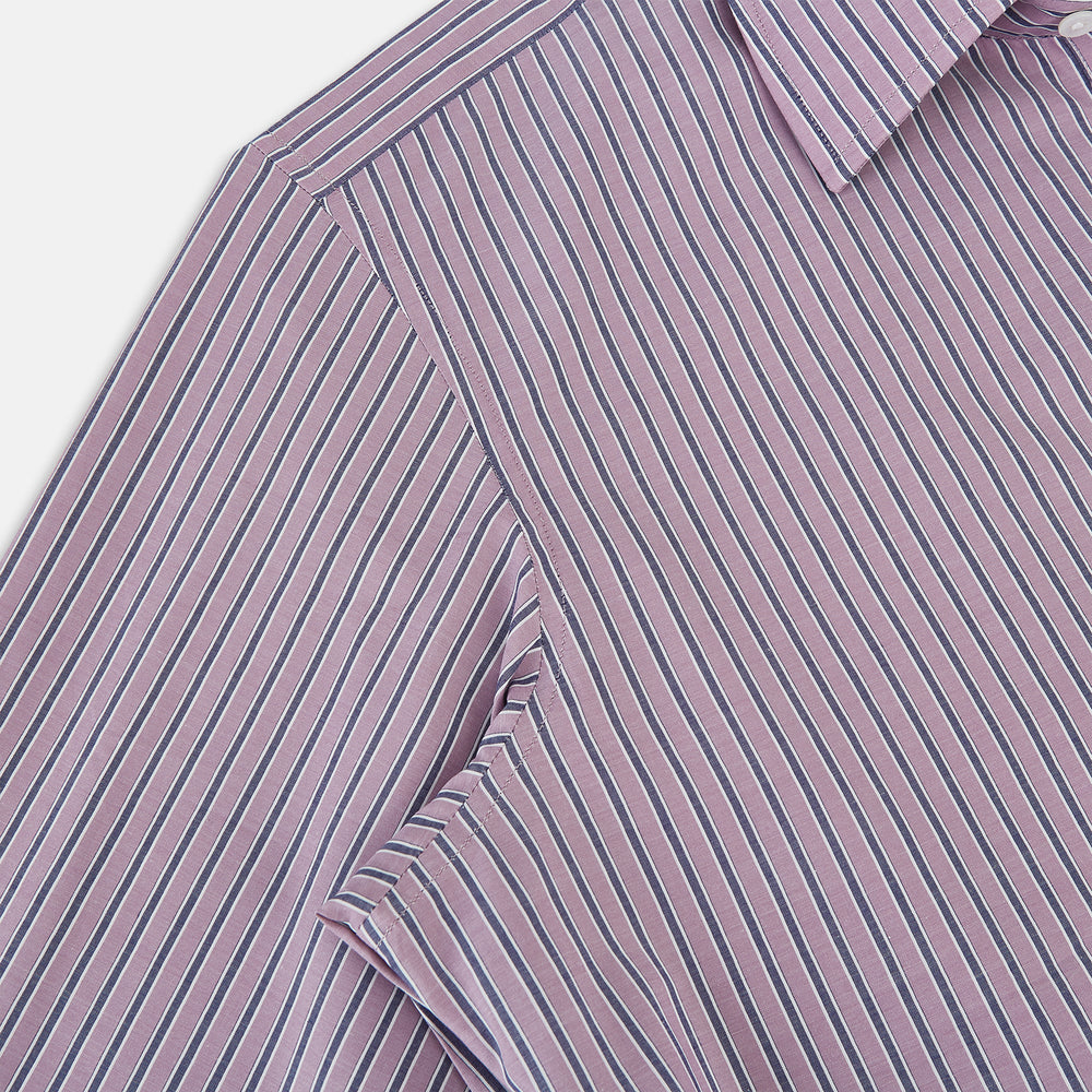 The Turnbull & Asser Antique Pink Ticking Stripe Westminster Shirt is a collared, long-sleeve button-up with thin vertical pink stripes on white, highlighting British craftsmanship. It’s shown neatly laid flat and fully buttoned.