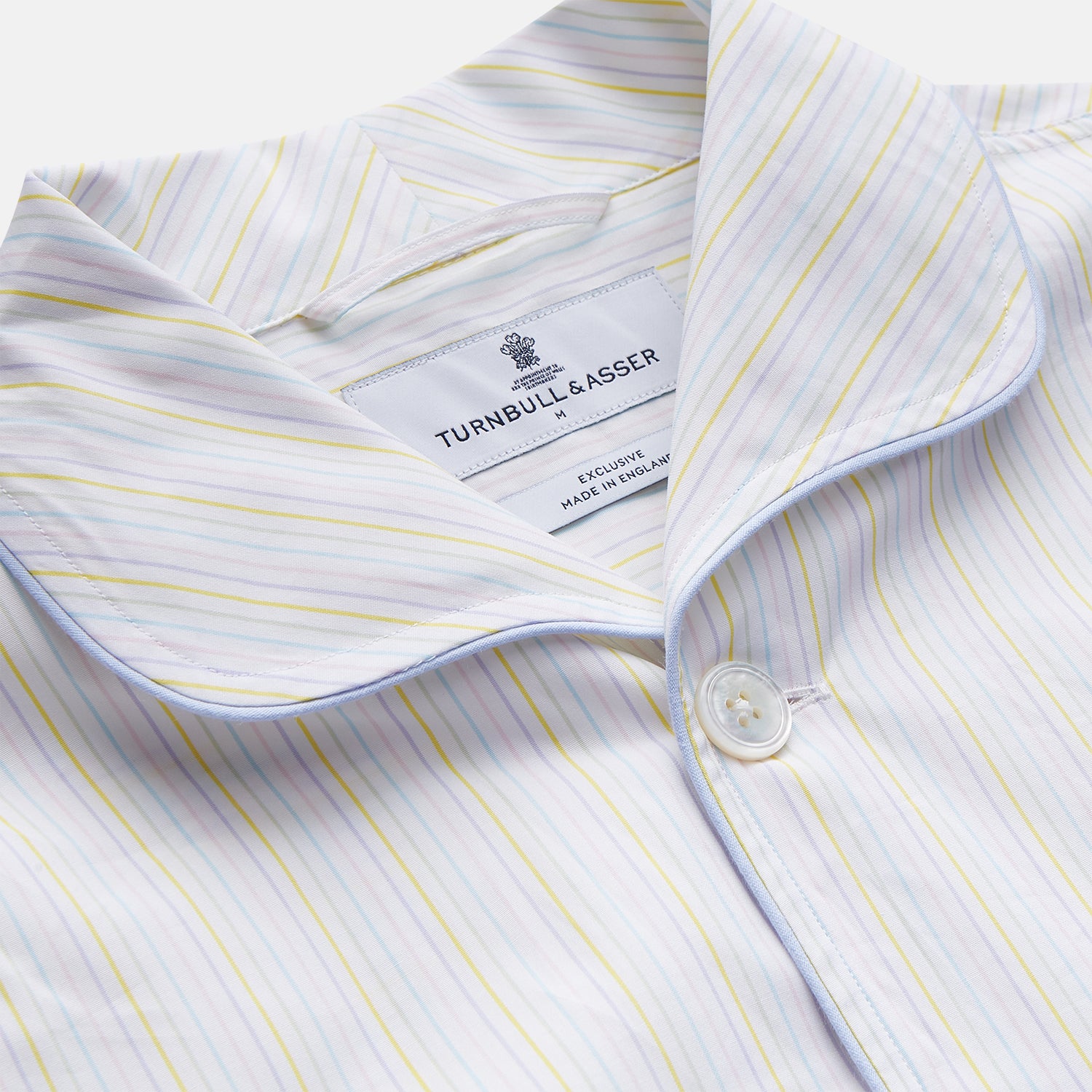 View 4 of product The Yellow Multi Stripe Cotton Quin Pyjama Set by Turnbull & Asser features a striped button-up top with chest pocket and drawstring pants—luxury sleepwear crafted from soft cotton, displayed on a white background.