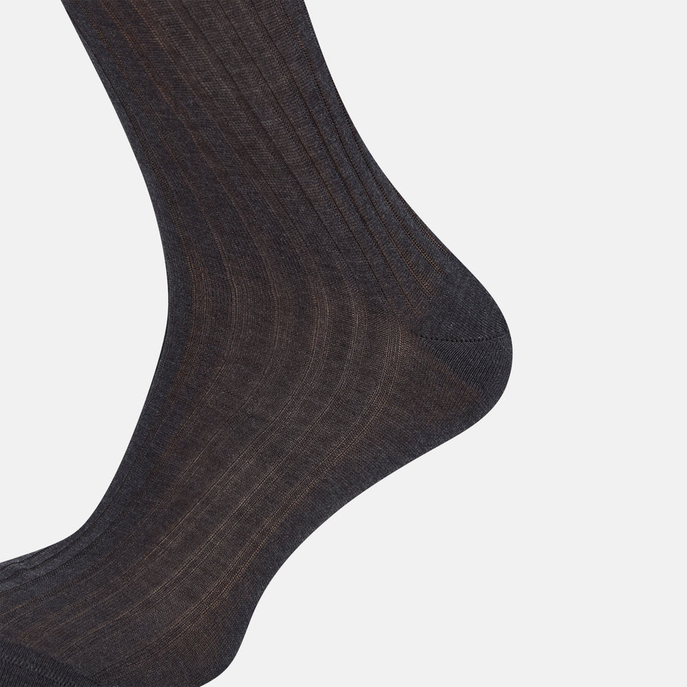 A single Charcoal Mid-Length Sock by Turnbull & Asser, crafted from mercerised Egyptian cotton in dark brown flat-knit, is displayed upright against a plain white background.