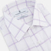 View 2 of product The Turnbull & Asser Lilac Grid Check Mayfair Shirt is a long-sleeve, button-up style crafted from Italian cotton with a white base and lilac grid check pattern, shown on a plain white background.