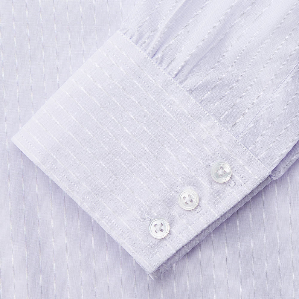 The Turnbull & Asser Soft Lilac Stripe Cotton Regular Fit Mayfair Shirt features a classic collar, cuffed long sleeves, and subtle vertical stripes, shown on a plain white background.
