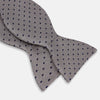 View 2 of product The Turnbull & Asser Navy and Silver Micro Dot Silk Bow Tie, featuring a refined dot pattern, is displayed on a white background.