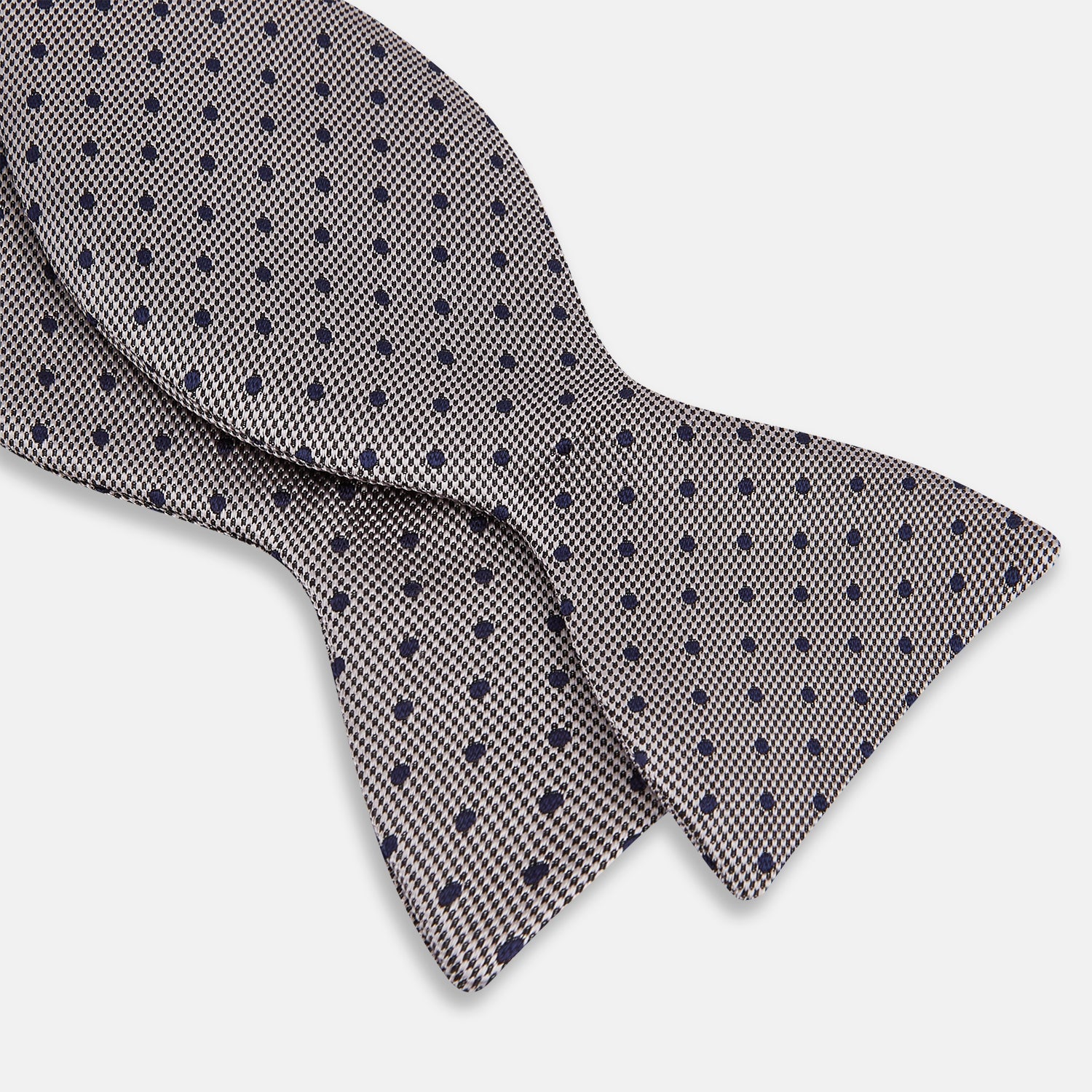 View 2 of product The Turnbull & Asser Navy and Silver Micro Dot Silk Bow Tie, featuring a refined dot pattern, is displayed on a white background.