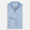 View 4 of product The Turnbull & Asser Pale Blue Cotton Cashmere Dorset Collar Richmond Shirt features long sleeves, a button-down collar, white buttons, and a chest pocket. It is neatly displayed flat on a white background.