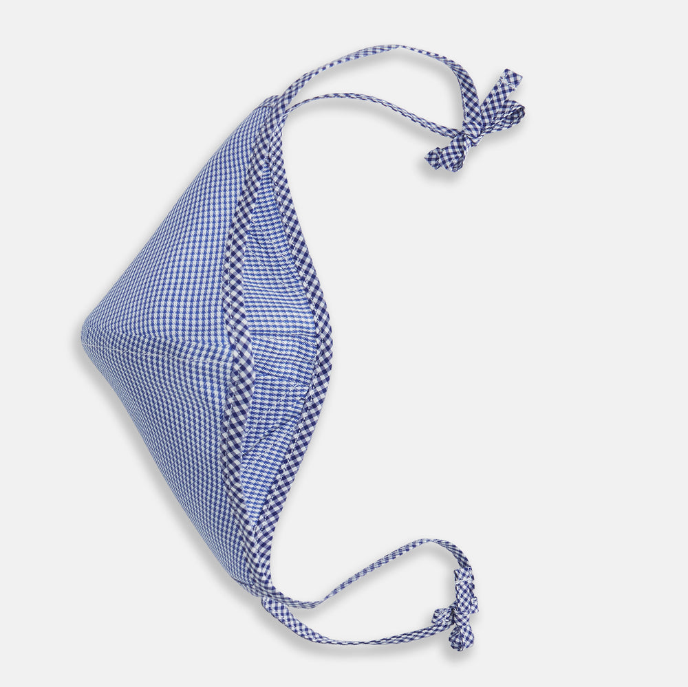 The Turnbull & Asser White & Navy Multi Check Commuter Mask comes with 3 Viroformula™ filters and two adjustable tie straps on each side, shown on a plain white background.