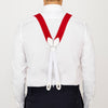 View 4 of product Two Red Adjustable Felt Braces by Turnbull & Asser, featuring white leather ends and silver-tone clasps, made in England from classic boxcloth, are laid flat on a white background.