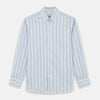View 1 of product The Turnbull & Asser Blue Multi Stripe Wool Blend Weekend Fit Hayne Shirt features vertical blue, yellow, and white stripes, a button-down collar, and buttoned cuffs. Laid flat on a white background.