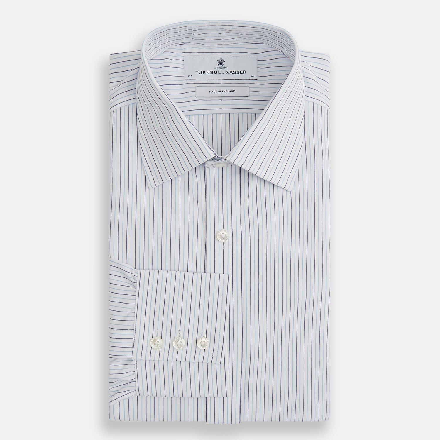 View 4 of product The Blue Double Pinstripe Mayfair Shirt by Turnbull & Asser is made from organic cotton with thin blue and white stripes, a pointed collar, and buttoned cuffs—perfect for elevating your workweek rotation.