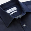 View 2 of product The Turnbull & Asser Blue Weekend Fit Finch Shirt features a Derby collar, chest pocket, classic white buttons, and timeless style, all in cotton. Laid flat on a white background.